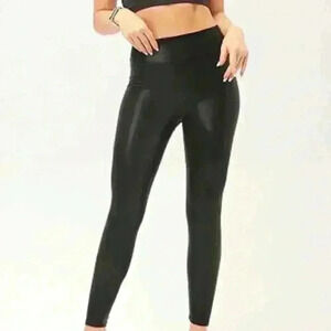 faux leather leggings . size XS 
RETRO GONG brand
